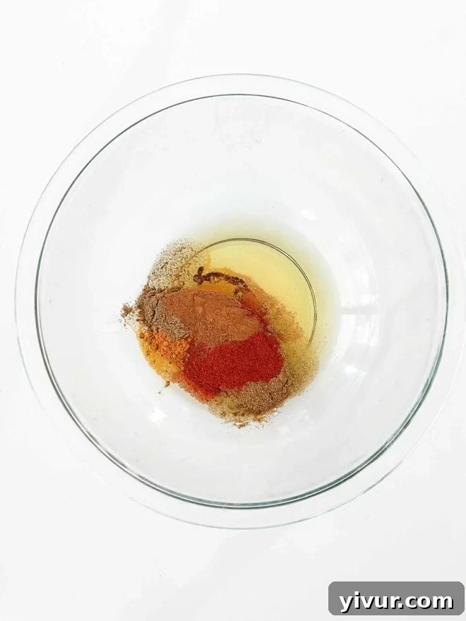 shawarma marinade ingredients in a glass bowl