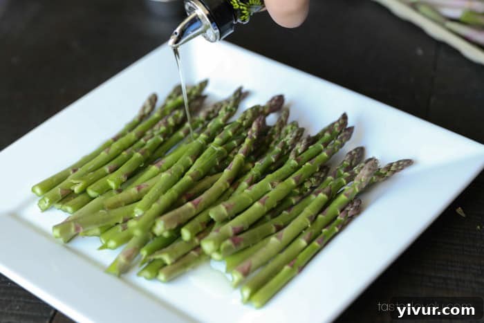 Perfect Grilled Asparagus 9 Asparagus spears drizzled with olive oil and seasoning