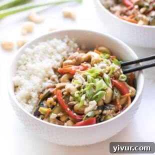 Whole30 and Keto chicken stir fry with cauliflower rice, a quick and healthy Asian-inspired dish.