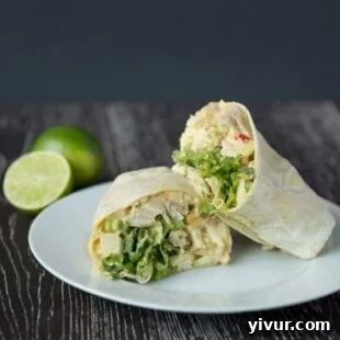 Curried chicken salad and apple wraps, showcasing a blend of savory and sweet flavors.