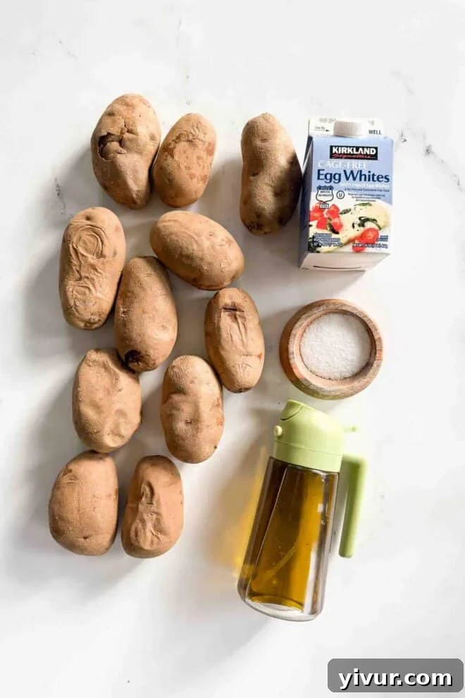 Two crispy oven-baked hash browns stacked on a plate