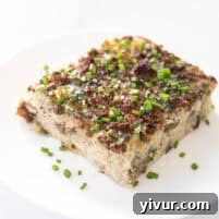 High Protein Bison Breakfast Casserole with Potatoes and Eggs on a white plate