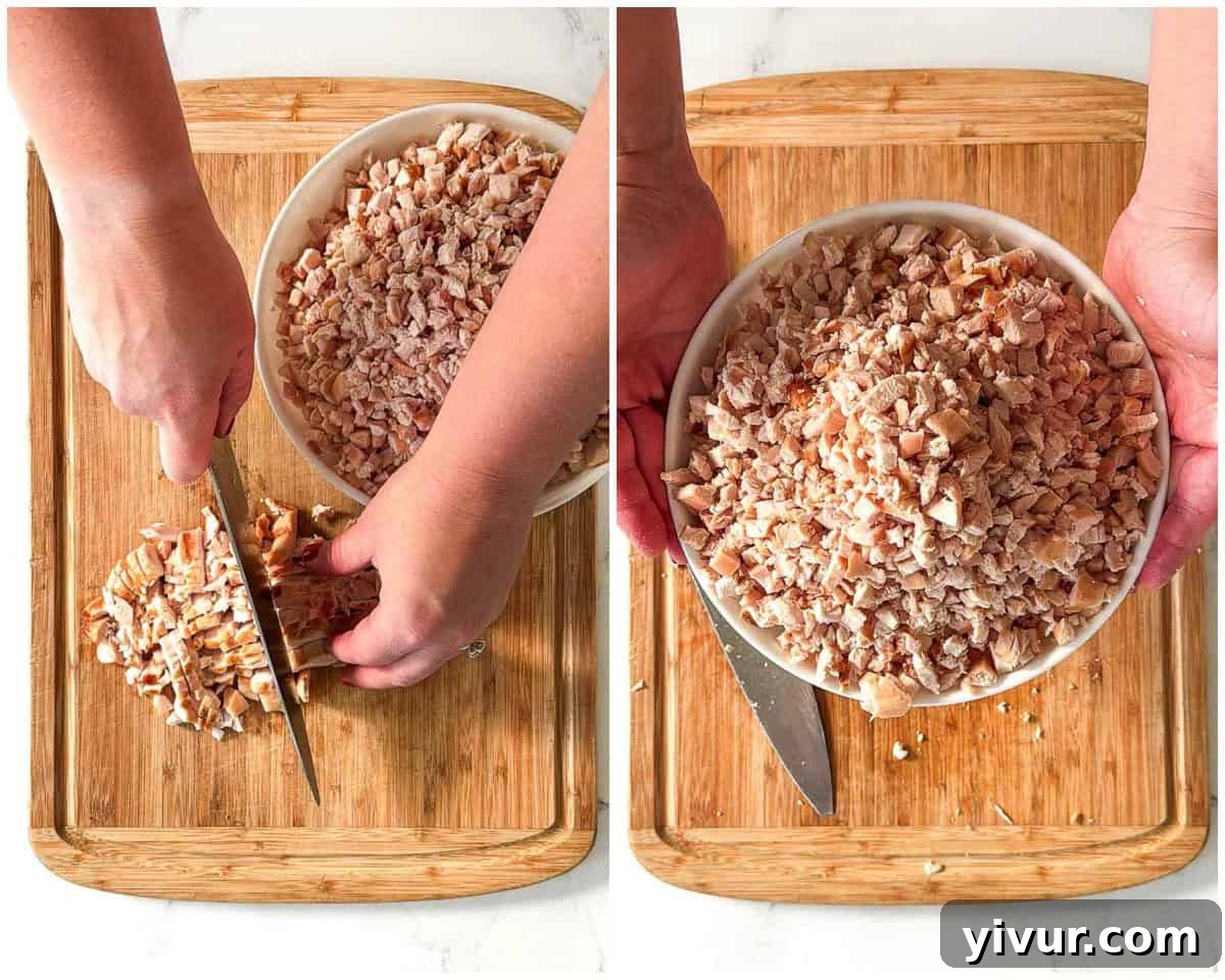 Chopping the chicken for High Protein Creamy Dijon Chicken Salad with Greek Yogurt