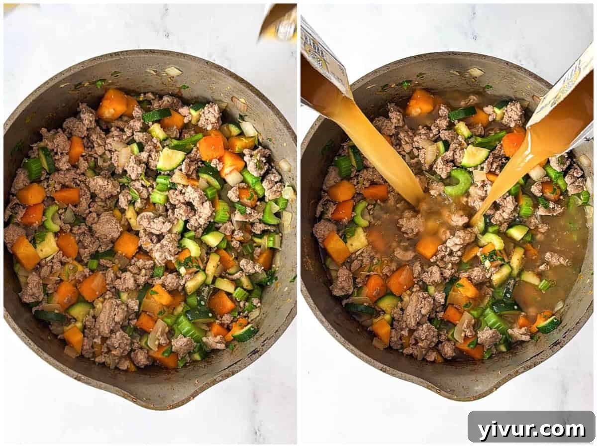 Cooked ground turkey and bone broth added to the vegetables in a pot, ready to simmer.