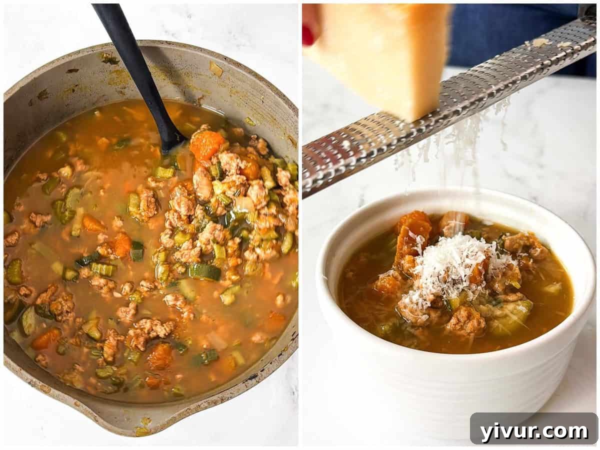 A ladle serving High Protein Turkey and Butternut Squash Soup into a bowl, topped with grated parmesan.