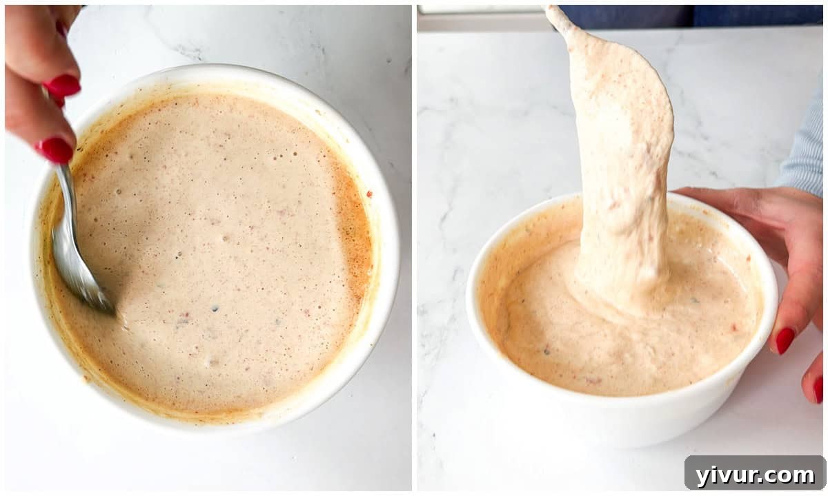 Protein-Boosted Cottage Cheese Queso 6 Step 3: Microwave-safe bowl with the queso dip heating in a microwave, showing the steam and melting cheese.