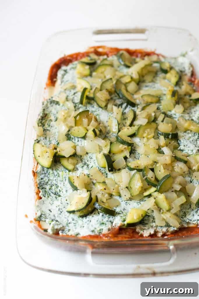 Close-up of a delicious slice of Garden Vegetable Lasagna with visible layers