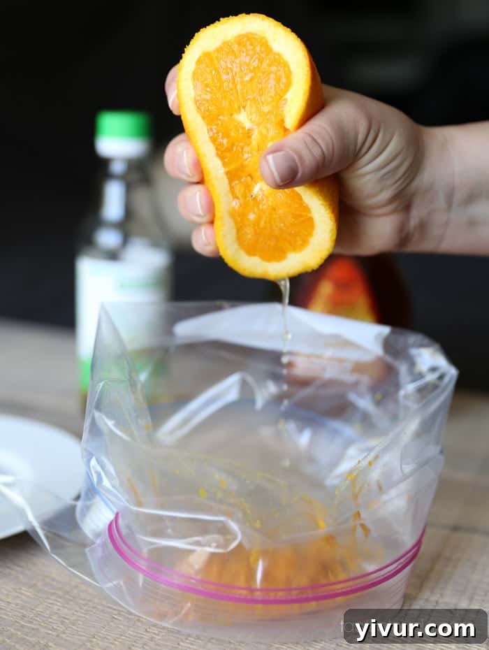 Squeezing Orange Juice into Marinade Bag