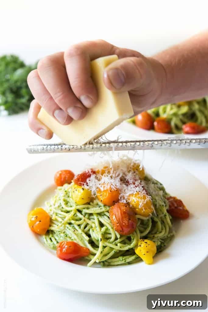 Blistered grape tomatoes glistening with olive oil and seasoning