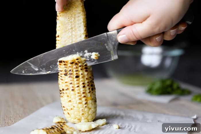 Cooled charred corn cobs ready for preparation