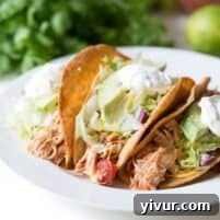 Slow Cooker Mexican Shredded Chicken Tacos