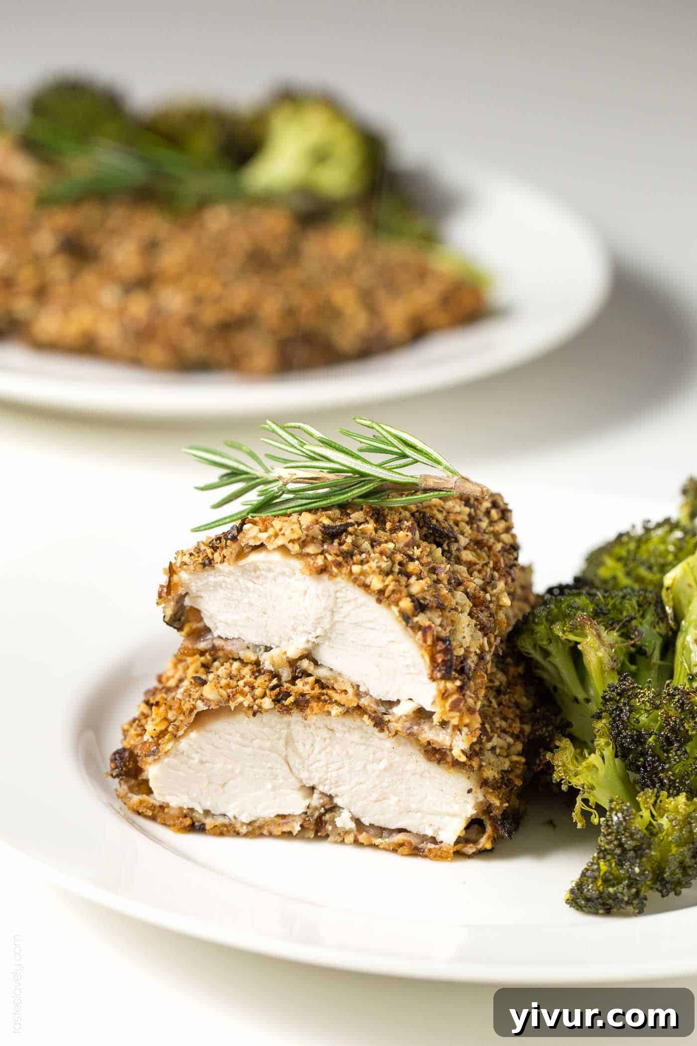 almond crusted chicken sliced and stacked on top of each other