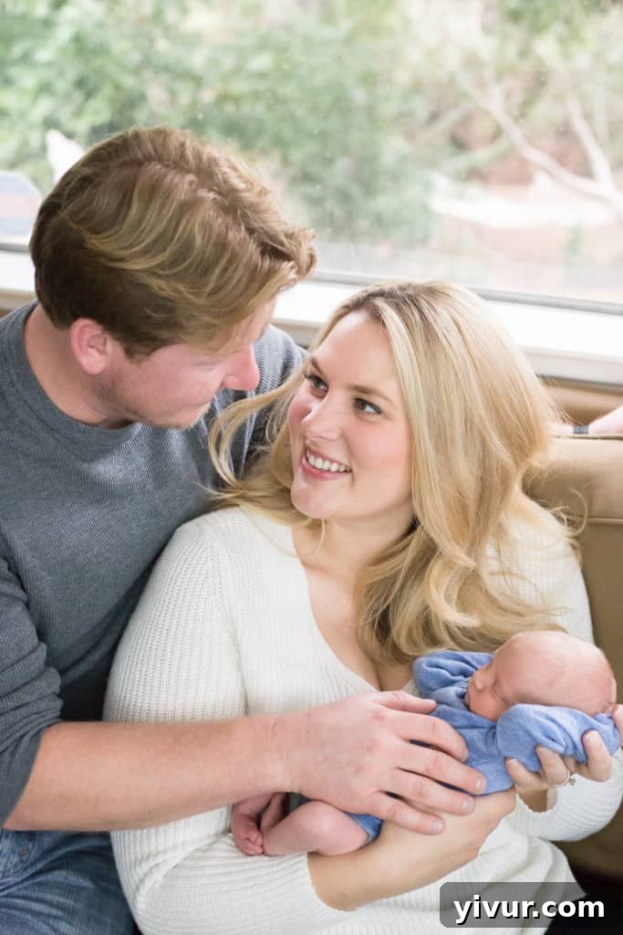 The Gruendl family, mother, father, and their baby Joshua, happy and together