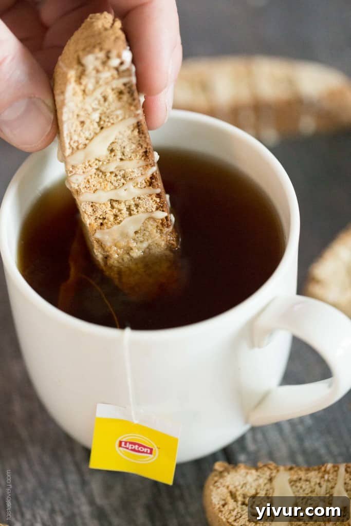 A cup of Lipton Enticing Chai Black Tea paired with dairy-free Chai Spice Biscotti.