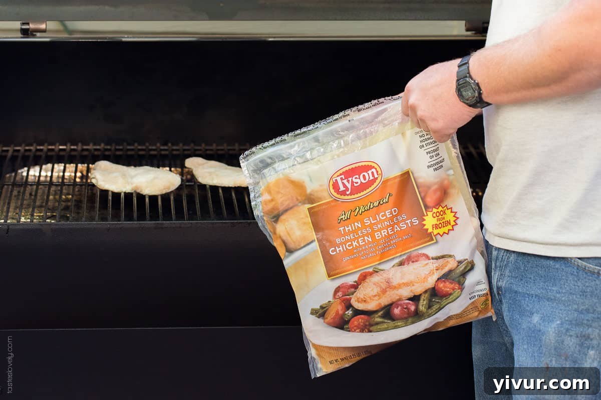 Close-up of a perfectly assembled California Chicken Club Burger, showcasing its delicious layers