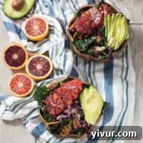 Winter Kale and Blood Orange Salad with chicken and vinaigrette