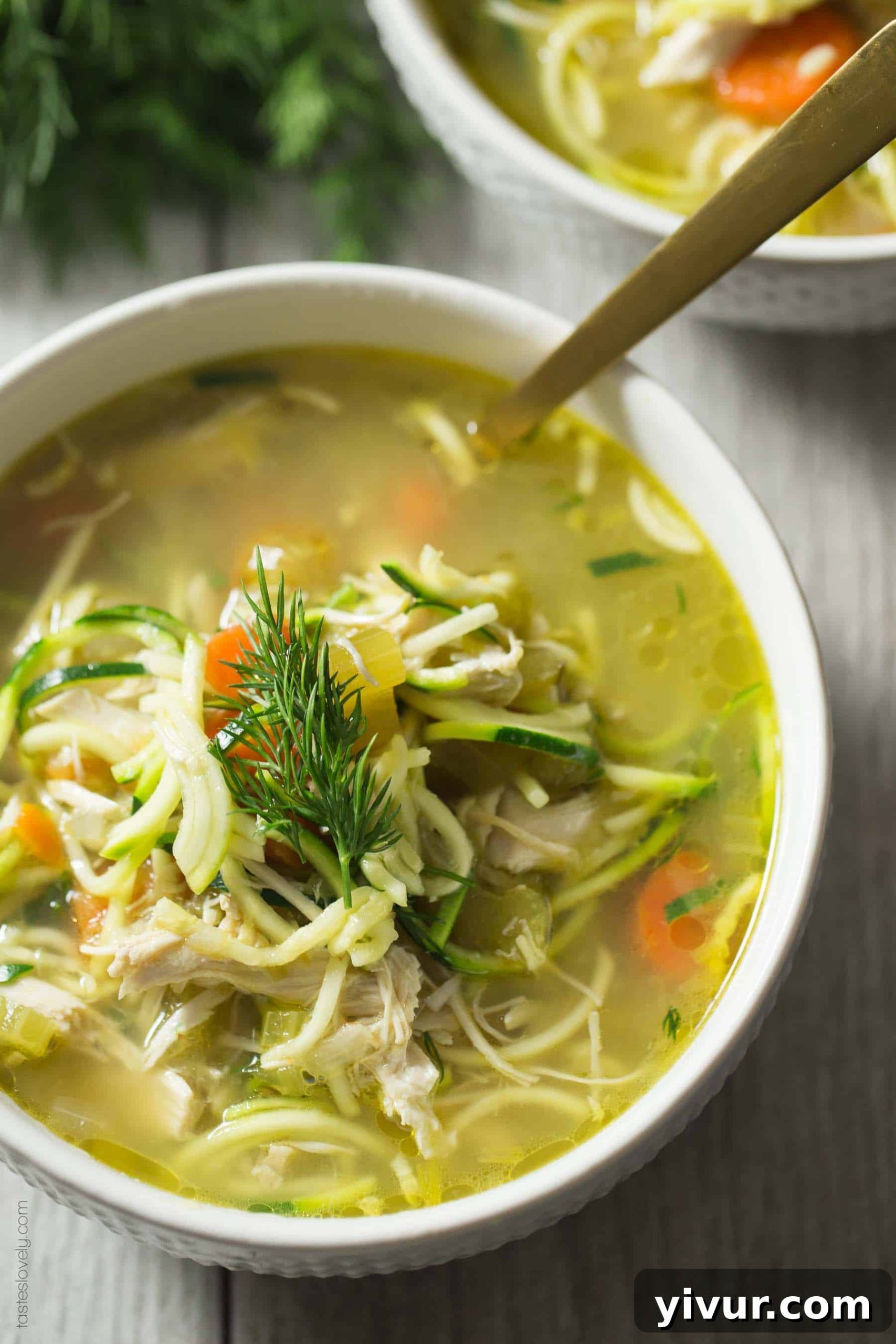 Comforting Whole30 Keto Chicken Zoodle Soup with fresh dill, perfect for healing