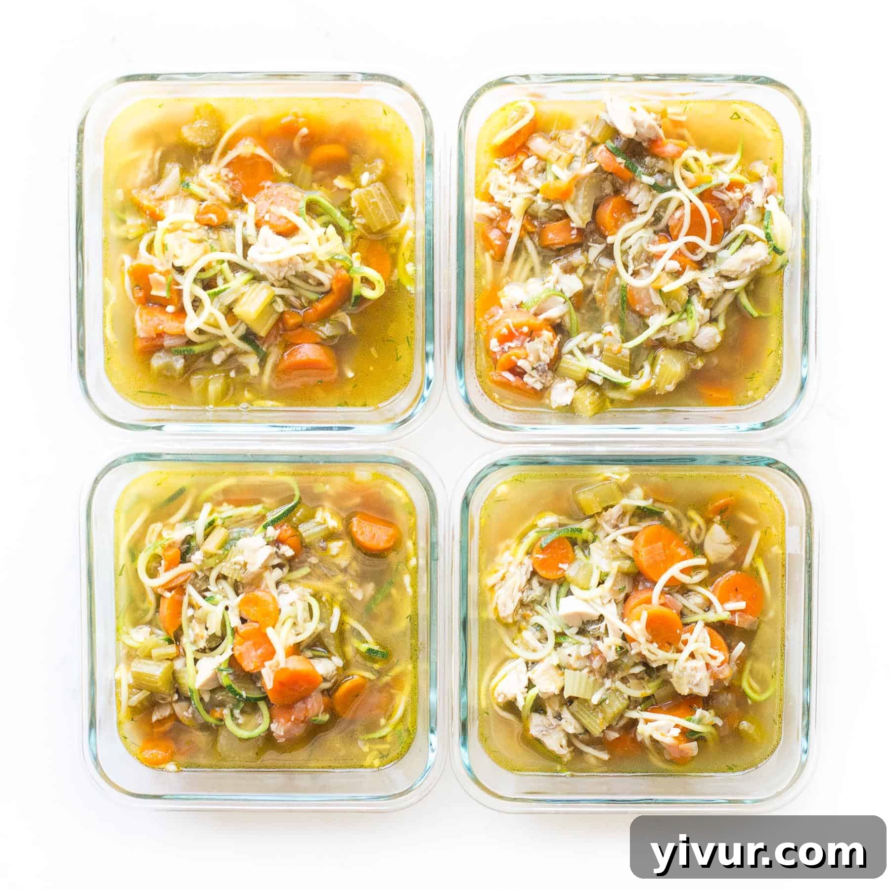 Chicken Zoodle Soup prepped in glass containers for healthy meal planning