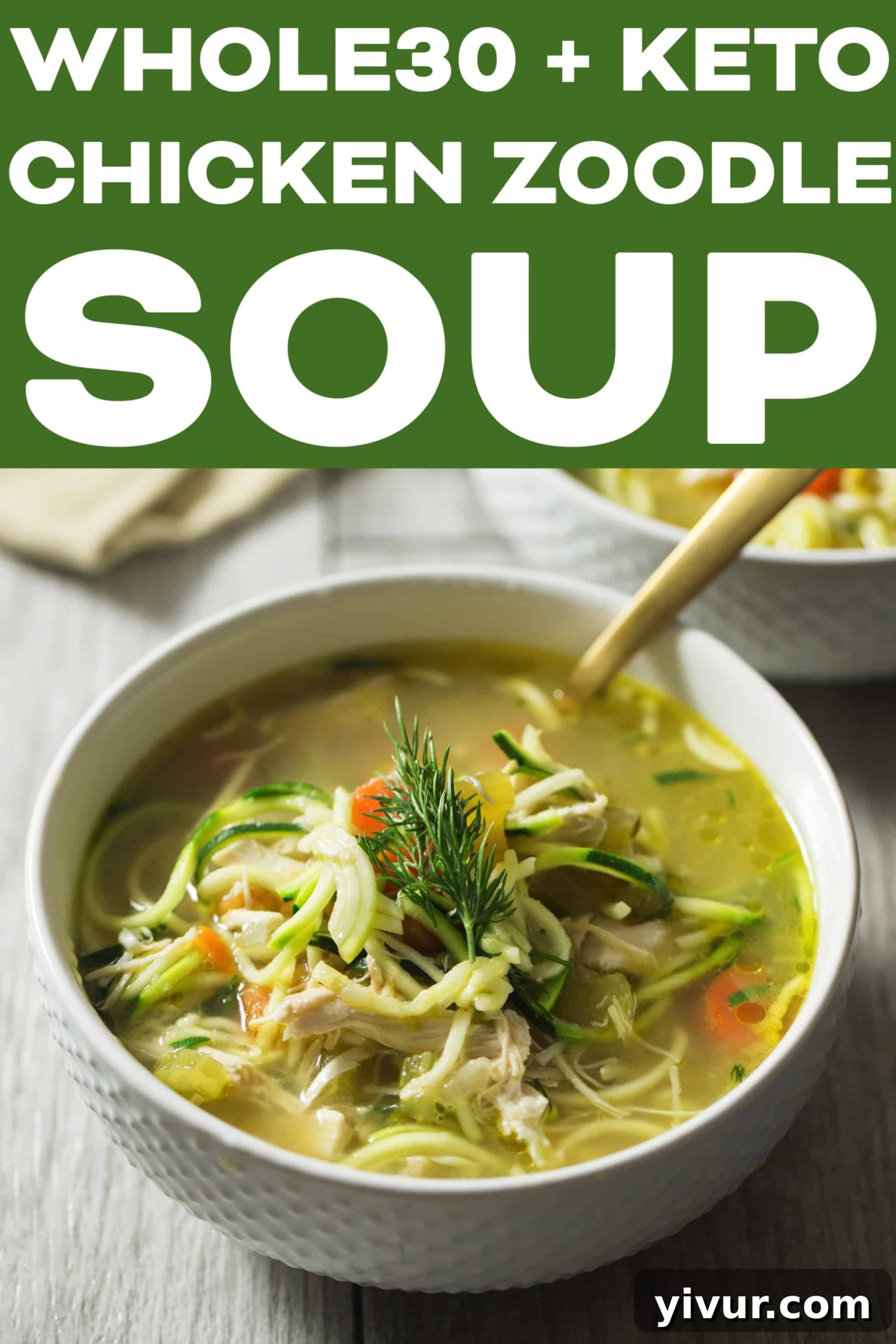 A bowl of Whole30 Keto Chicken Zoodle Soup ready to be enjoyed, garnished with fresh dill