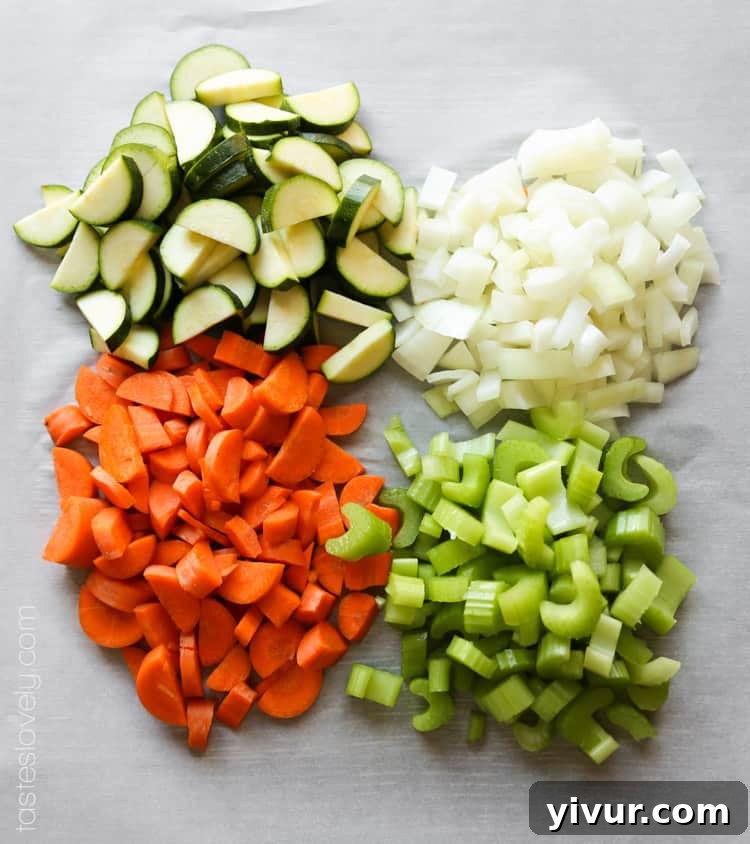 Freshly chopped carrots, zucchini, celery, and onion for soup