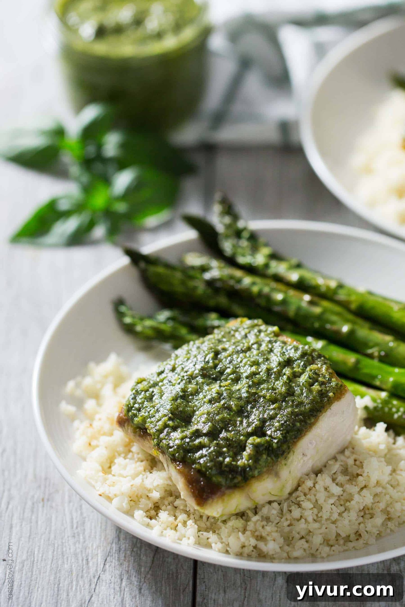 Seared Pesto Mahi Mahi 2 Delicious Pesto Mahi Mahi, a simple and fresh fish dinner recipe that is paleo, gluten free, Whole30 and dairy free, served on a plate.