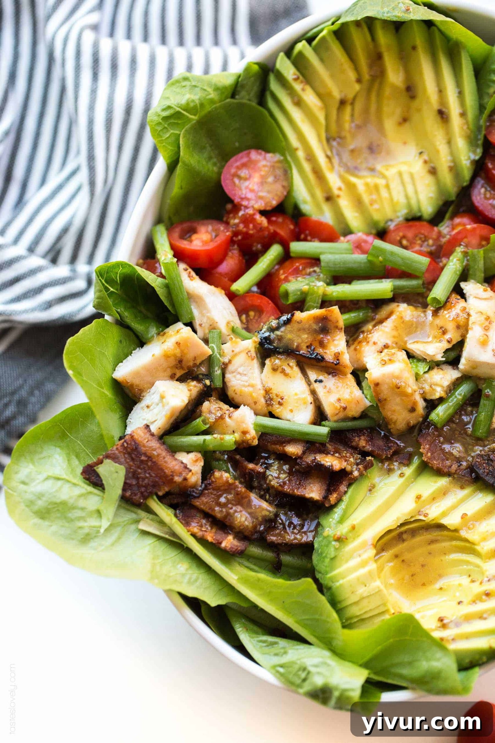 Paleo Honey Mustard Chicken Power Bowl with Crispy Bacon and Avocado 2 Delicious Paleo Honey Mustard Chicken, Bacon & Avocado Salad with fresh tomatoes and scallions. A healthy, gluten-free, dairy-free, and refined sugar-free summer dinner recipe.