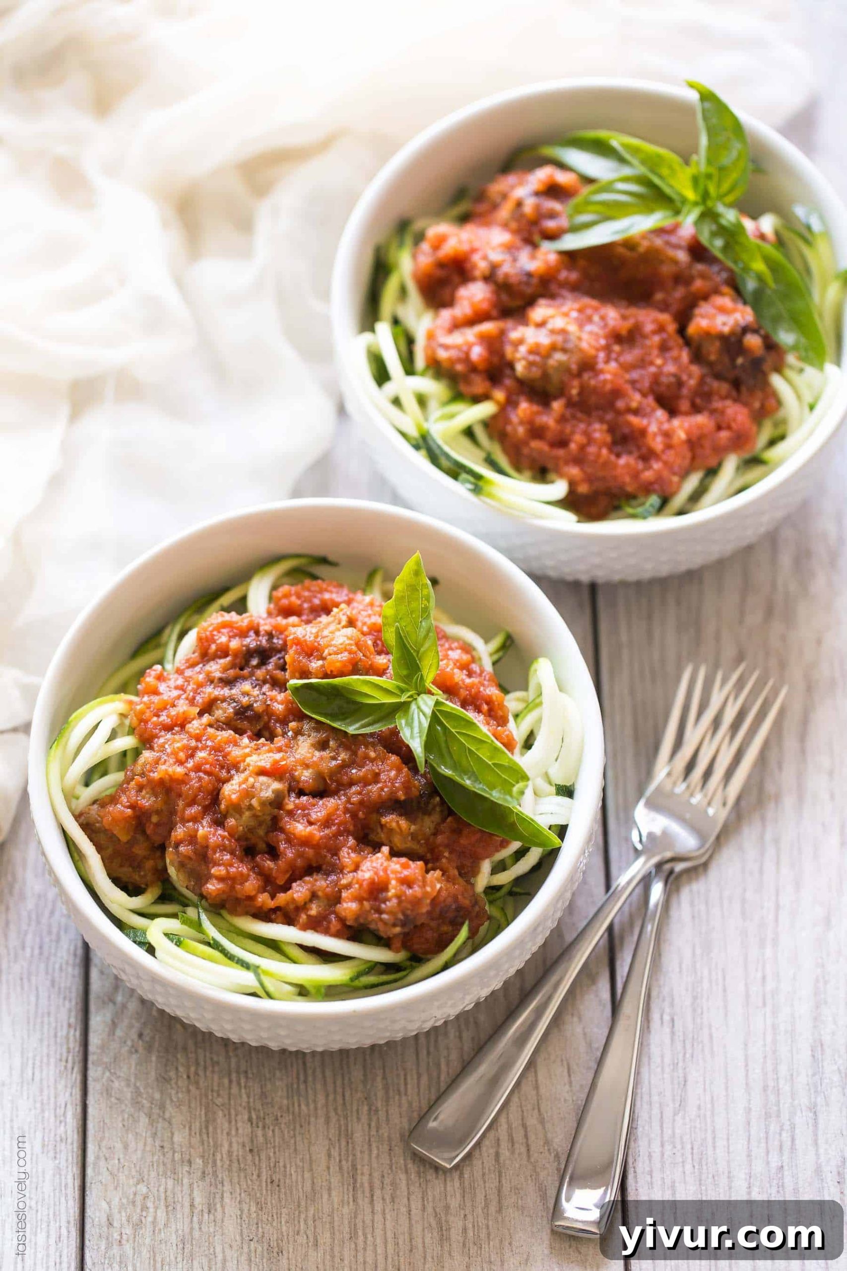 Paleo Whole30 Sausage Zoodle Marinara 2 Homemade paleo & Whole30 marinara sauce, made from canned tomatoes with italian sausage. Served over zucchini noodles. A healthy and delicious dinner recipe! Paleo, whole30, gluten free, grain free, dairy free, sugar free, clean eating.