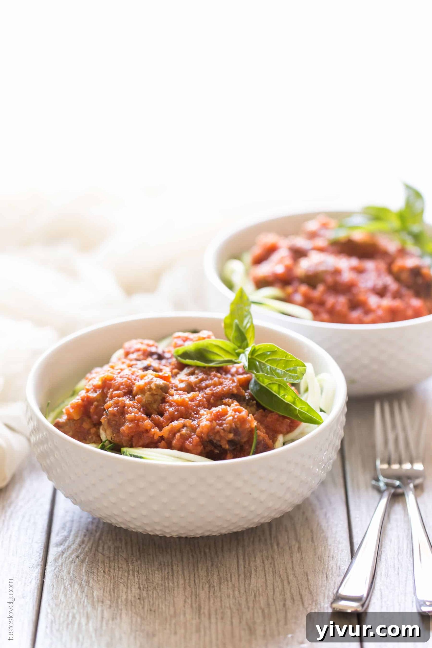 Paleo Whole30 Sausage Zoodle Marinara 3 Homemade paleo & Whole30 marinara sauce, made from canned tomatoes with italian sausage. Served over zucchini noodles. A healthy and delicious dinner recipe! Paleo, whole30, gluten free, grain free, dairy free, sugar free, clean eating.