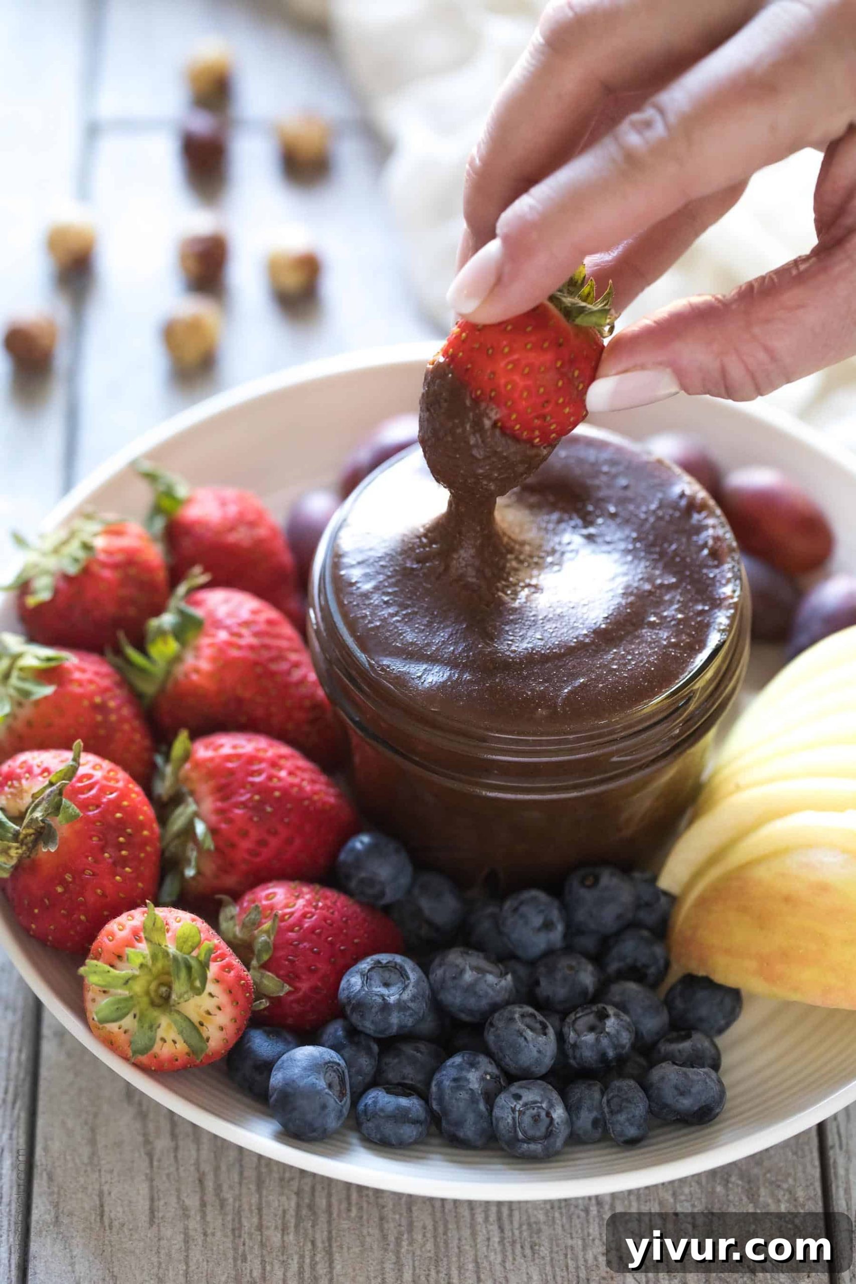 Delicious homemade Paleo Nutella, a healthy hazelnut spread, ready to be enjoyed.