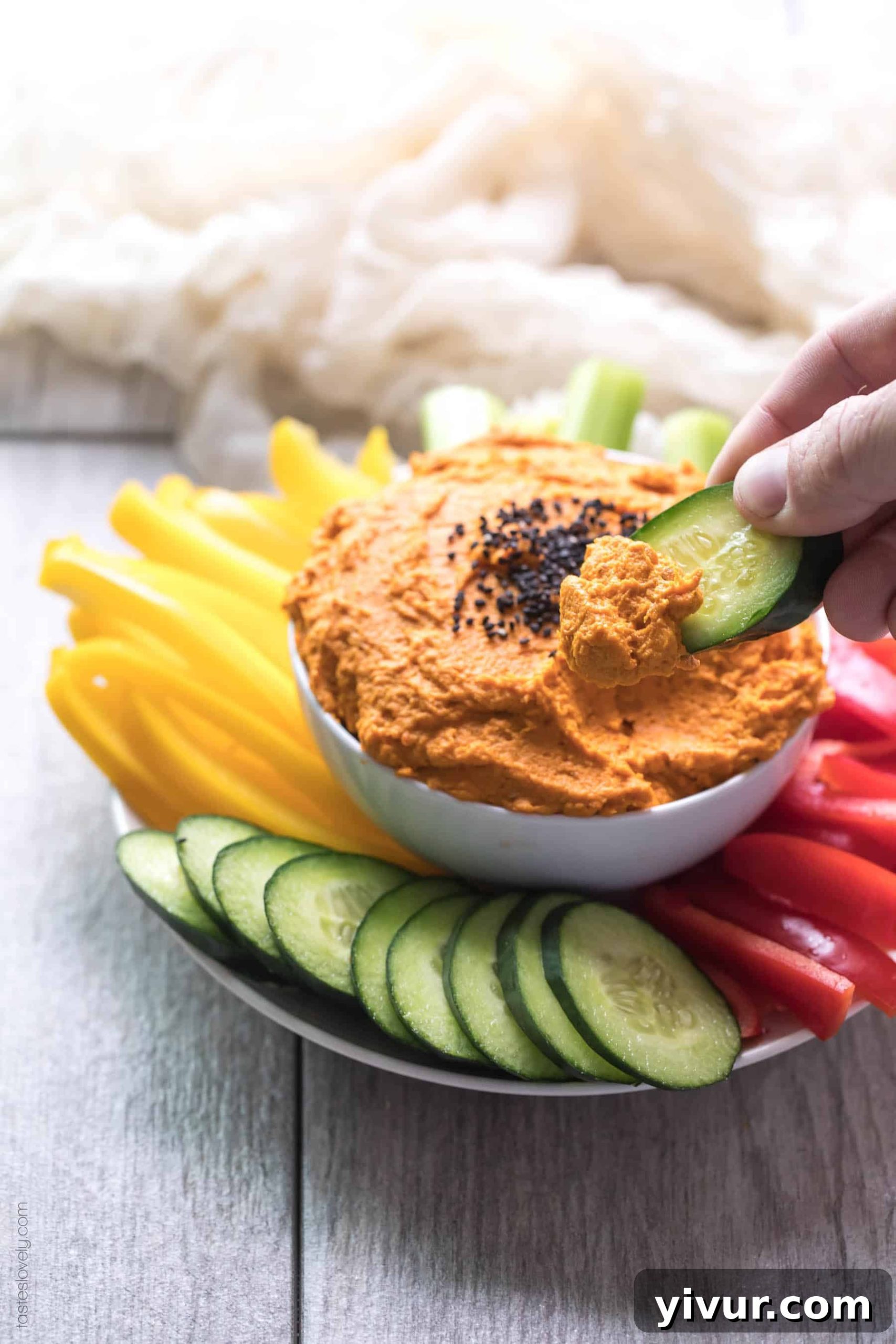 Garnished roasted carrot dip ready to be served at room temperature