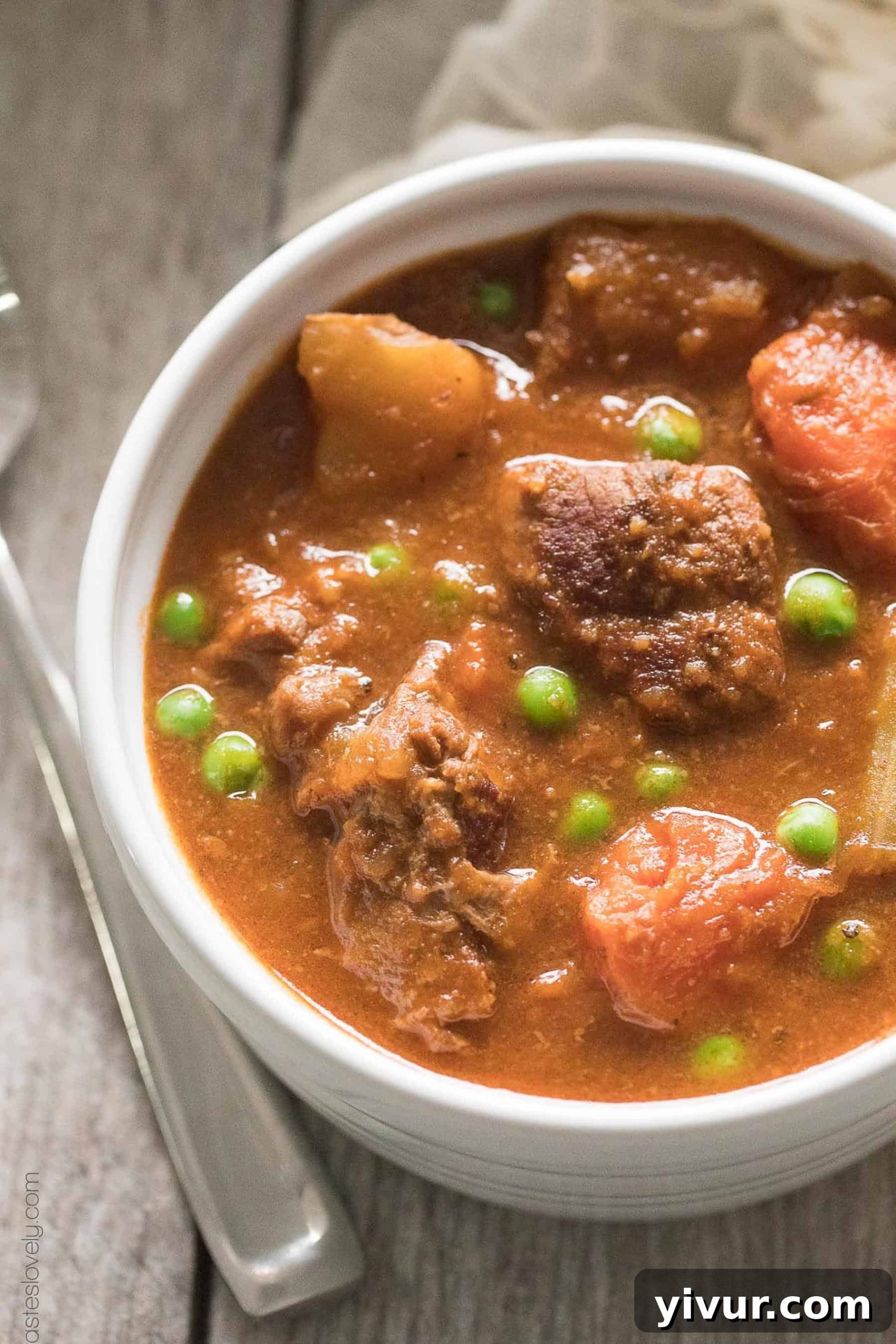 Hearty Paleo and Whole30 Beef Stew in a white bowl, ready to be served.