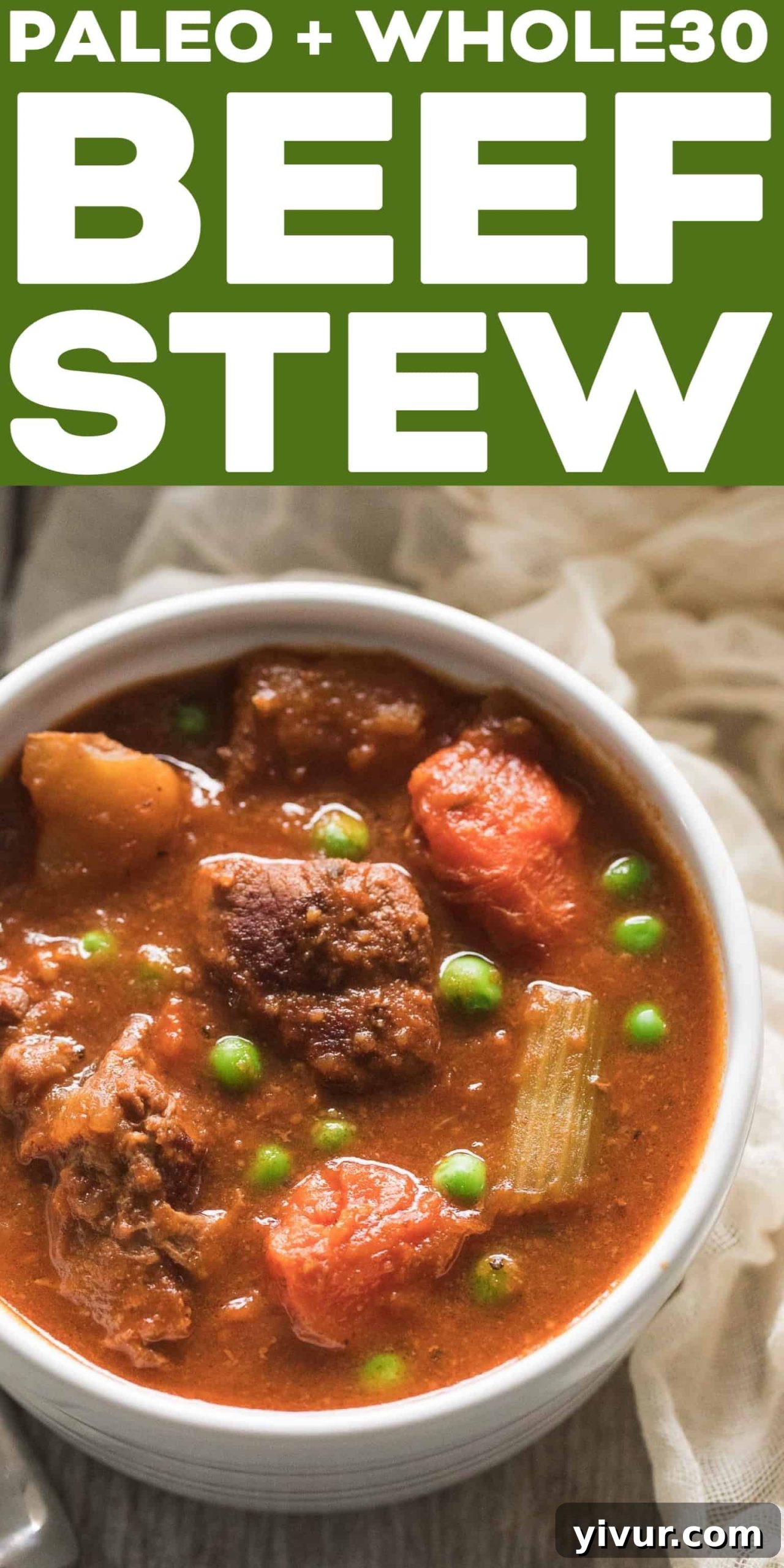 Large overhead shot of Paleo and Whole30 Beef Stew in a Dutch oven, surrounded by ingredients.