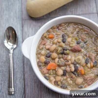 Wholesome Chicken and Kale Potato and Leek Soup 9 Wholesome Mixed Bean & Ham Hock Soup in a ceramic bowl.
