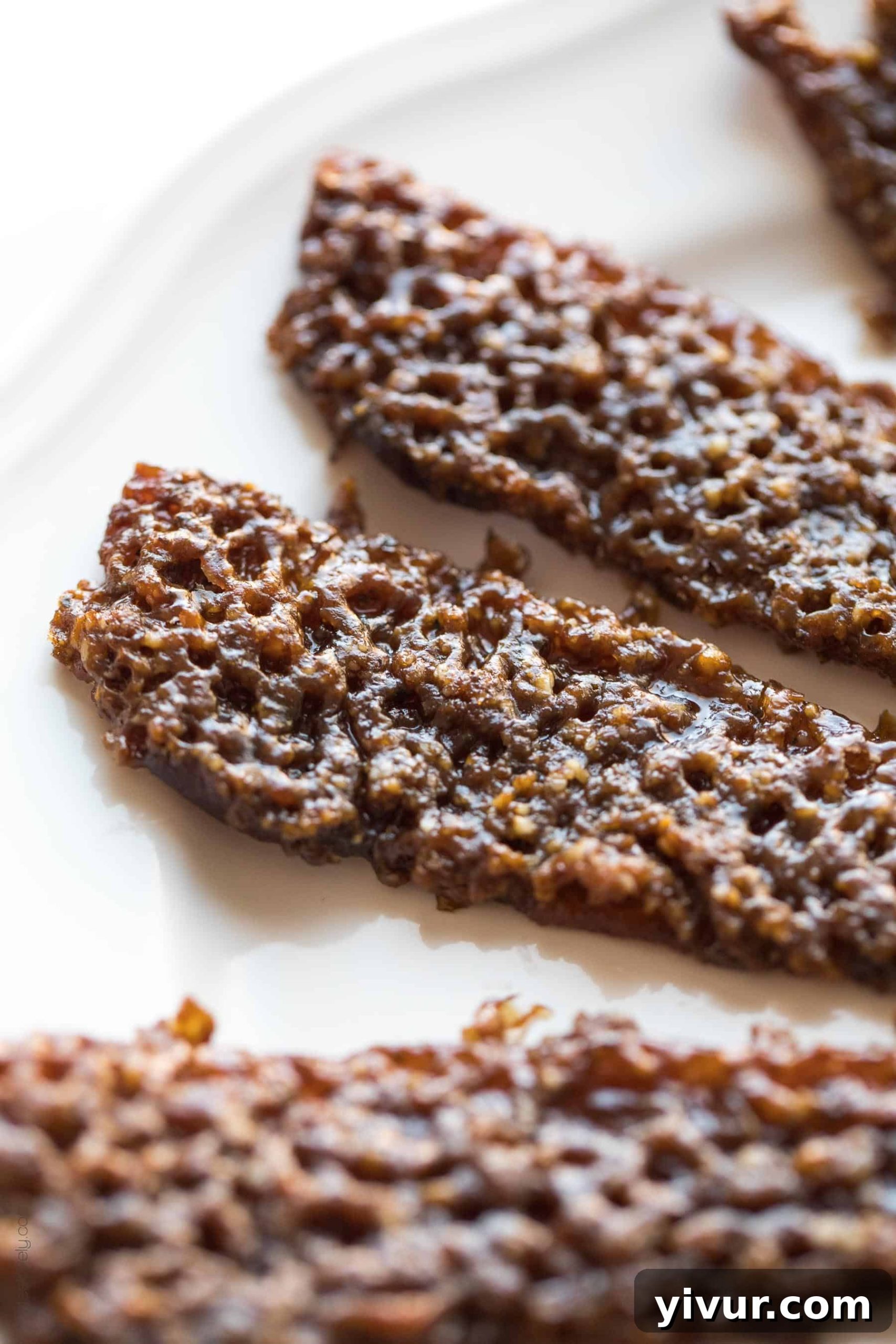 Irresistible Paleo Pecan Candied Bacon with a crispy, crunchy topping – a perfect salty-sweet brunch or appetizer