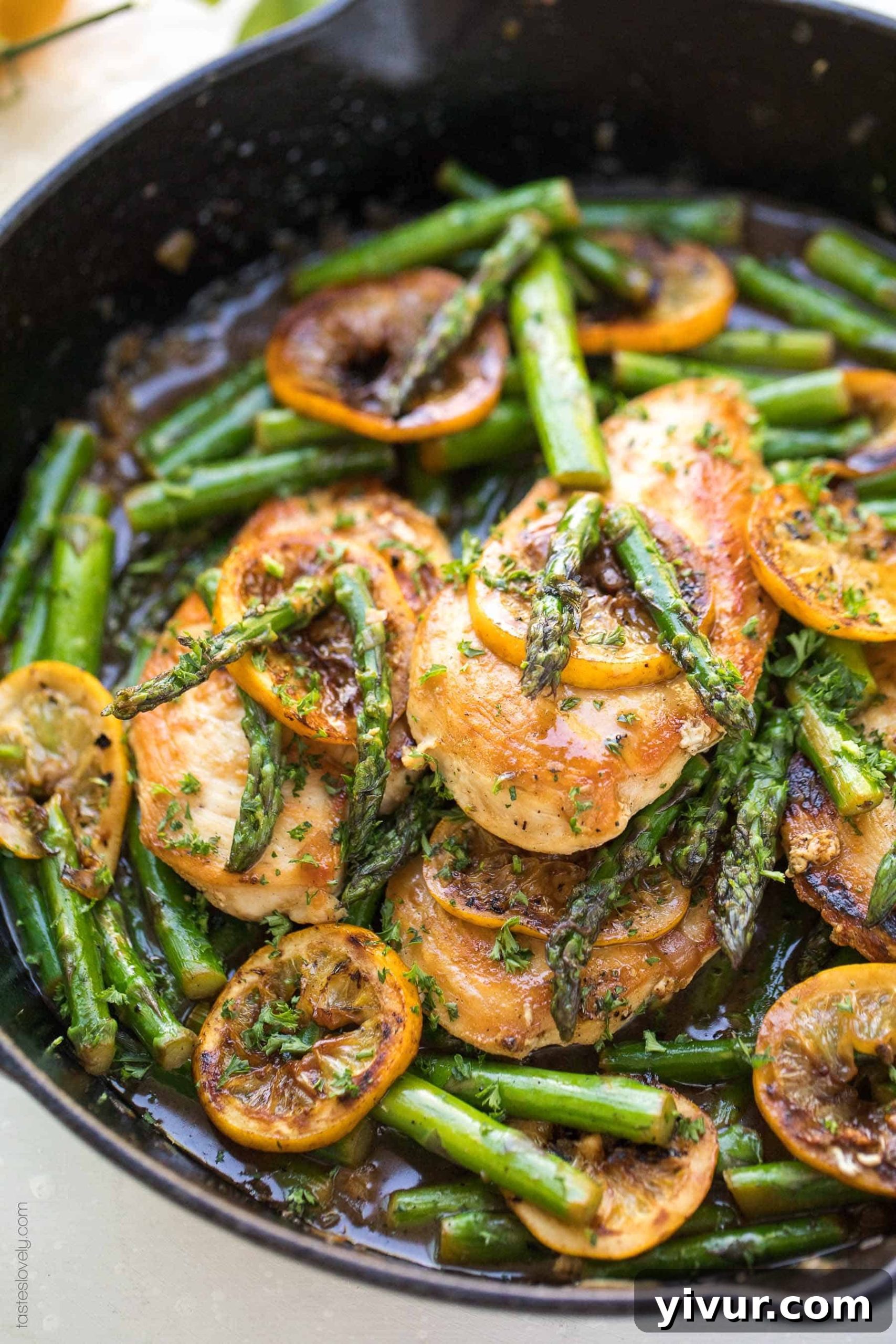 Zesty Paleo Lemon Honey Chicken and Asparagus Skillet 6 Detail shot of the juicy chicken breast and vibrant green asparagus coated in the sweet and tangy lemon honey sauce, perfect for a paleo-friendly and healthy dinner.