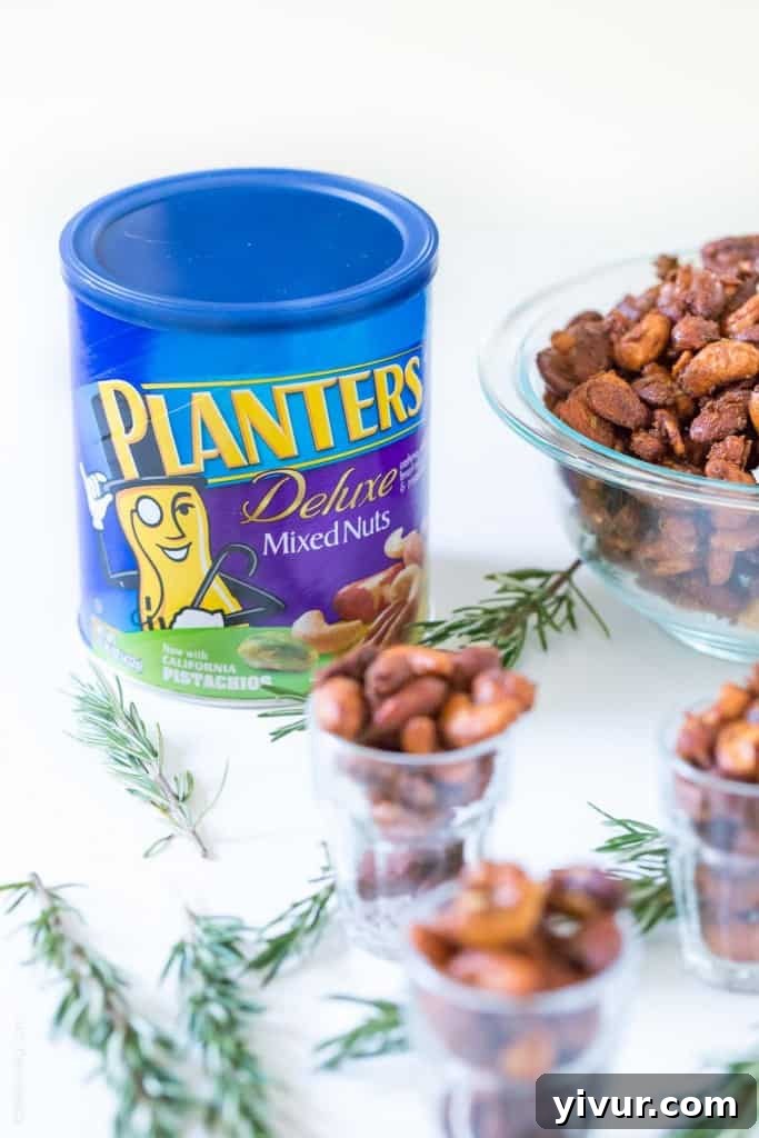Sweet & Spicy Rosemary Roasted Mixed Nuts - perfect mixed nuts appetizer or hostess gift!