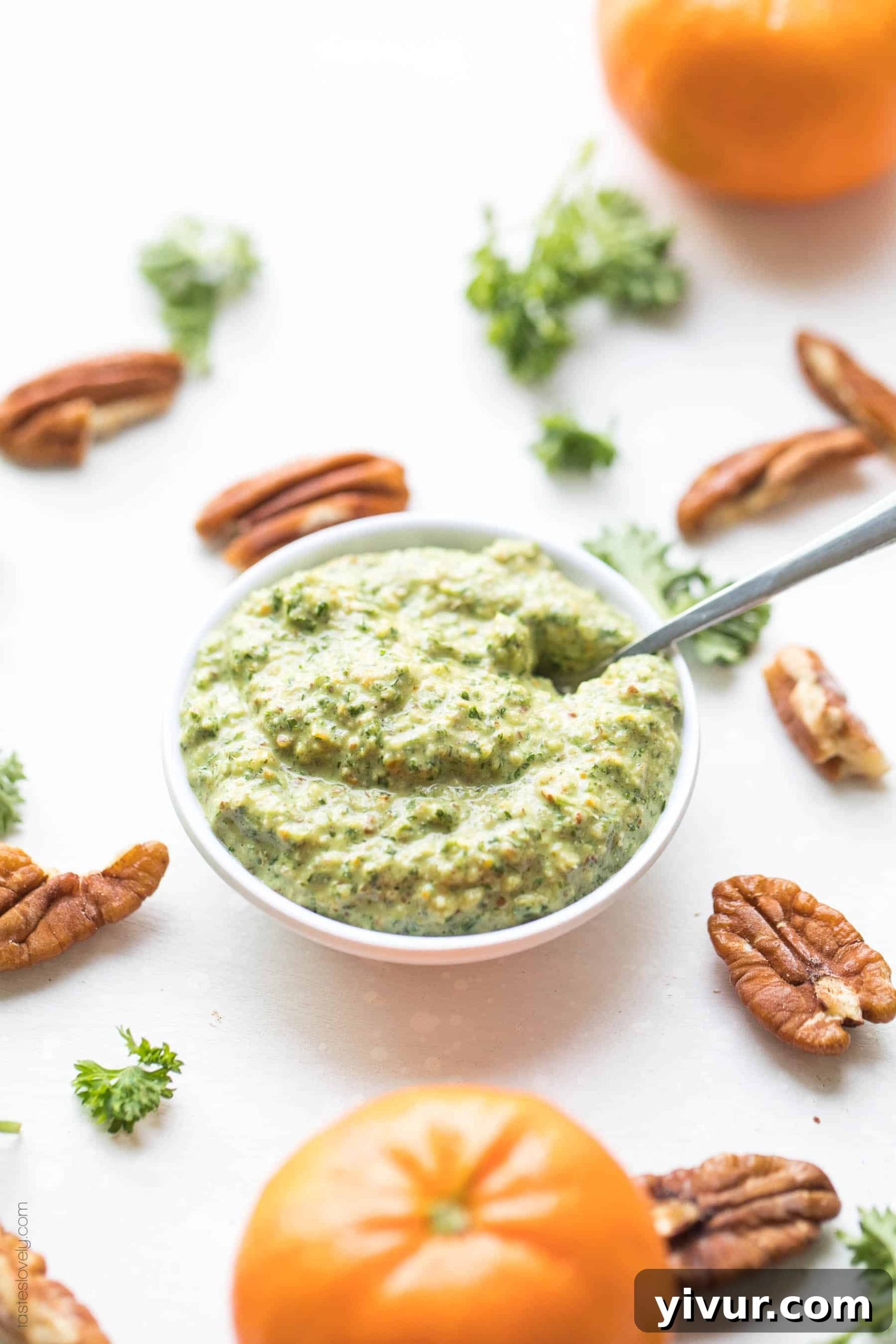 Close-up of the bright green Whole30 Keto Orange Parsley Sauce in a serving bowl, showcasing its smooth texture and fresh ingredients.
