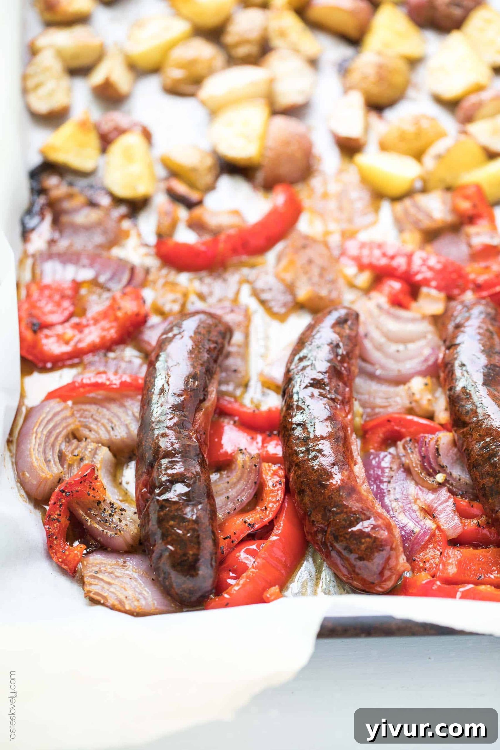 Effortless Paleo and Whole30 Sheet Pan Sausage, Bell Pepper and Potato Roast for a quick, healthy breakfast or dinner. Minimal prep, maximum flavor. Ideal for gluten-free, grain-free, dairy-free, sugar-free, soy-free, clean eating, real food lifestyles.