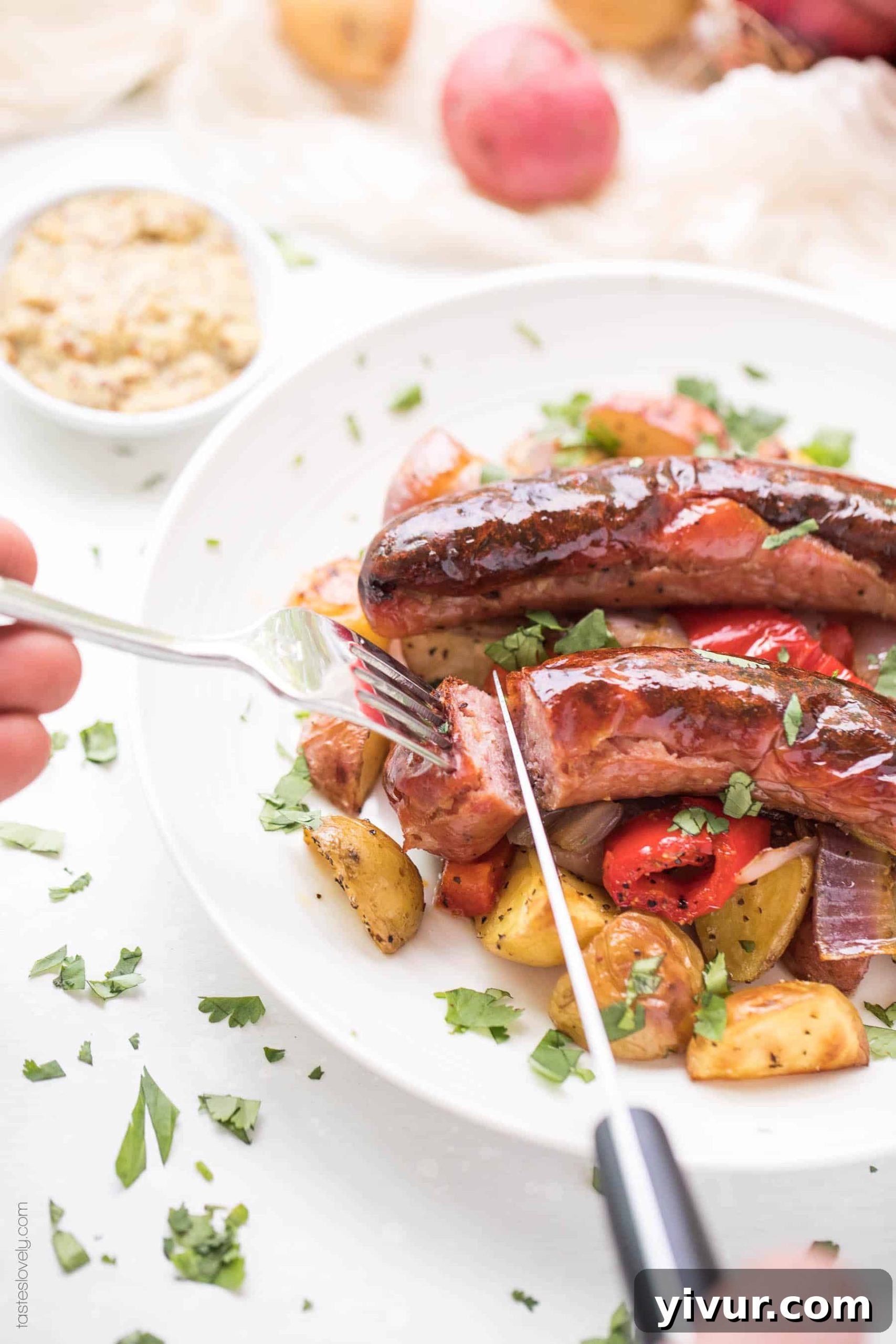 Paleo and Whole30 Sheet Pan Sausage, Bell Pepper and Potato Roast: a quick, healthy breakfast or dinner, ready with just 10 minutes of prep. Enjoy gluten-free, grain-free, dairy-free, sugar-free, keto, clean eating, real food benefits.