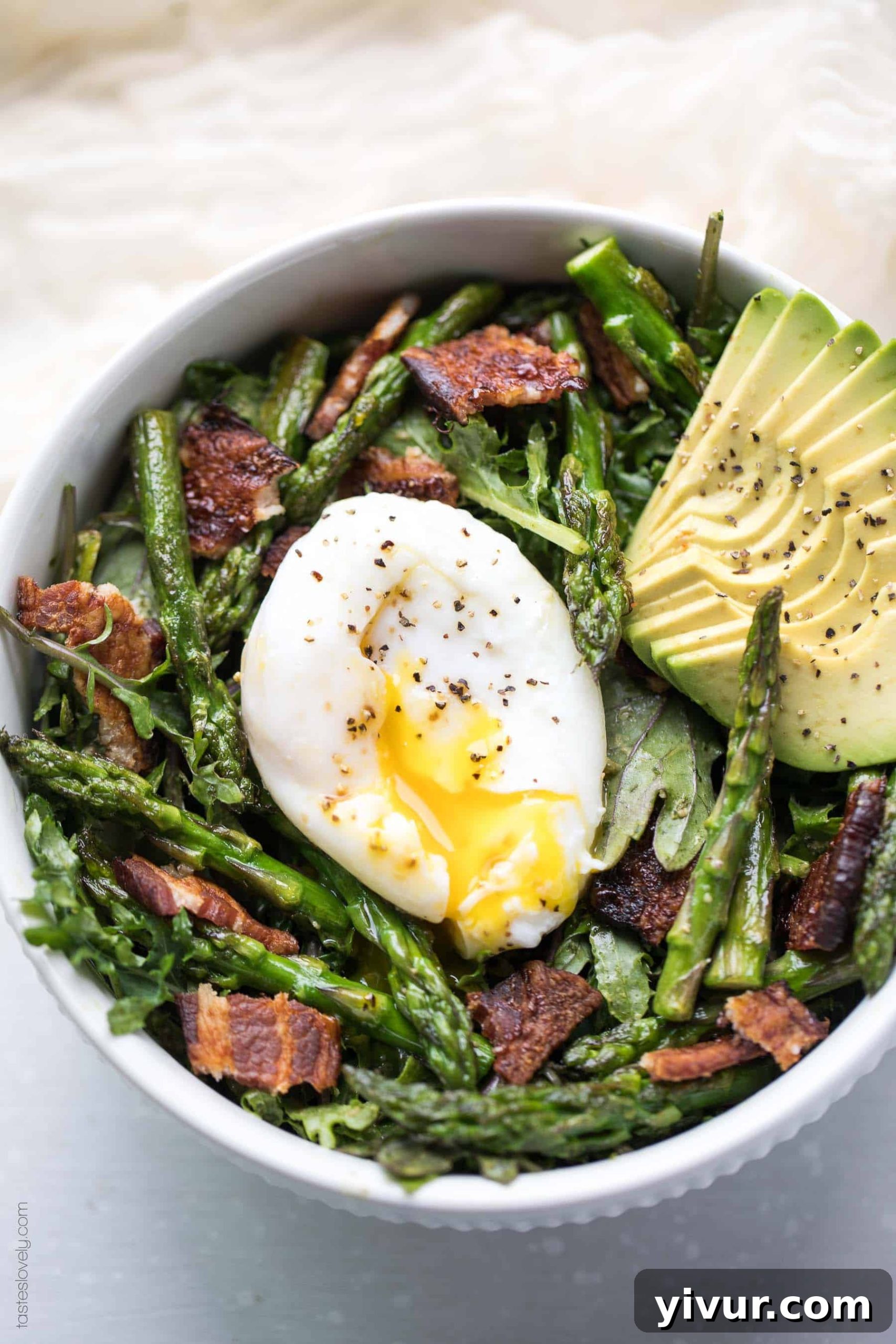 Keto + Whole30 Brunch Kale Salad - baby kale tossed in an herby green dressing topped with bacon, asparagus and a poached egg (gluten free, grain free, dairy free, sugar free, clean eating)