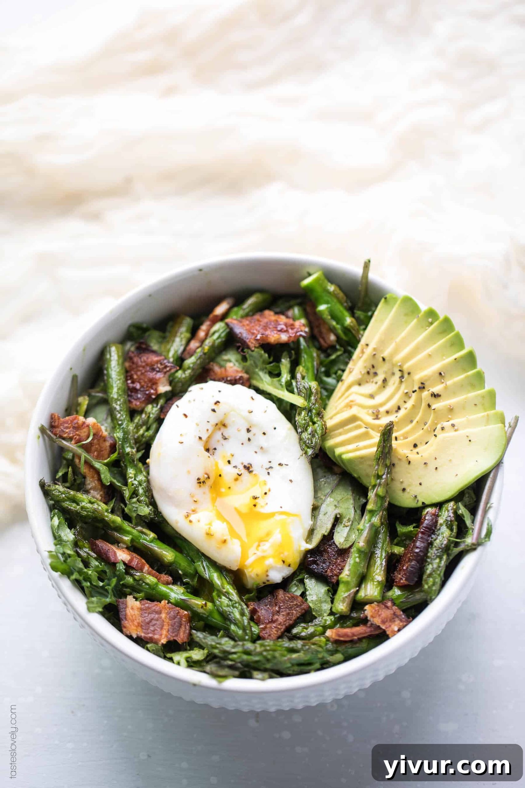 Keto + Whole30 Brunch Kale Salad - baby kale tossed in an herby green dressing topped with bacon, asparagus and a poached egg (gluten free, grain free, dairy free, sugar free, clean eating)