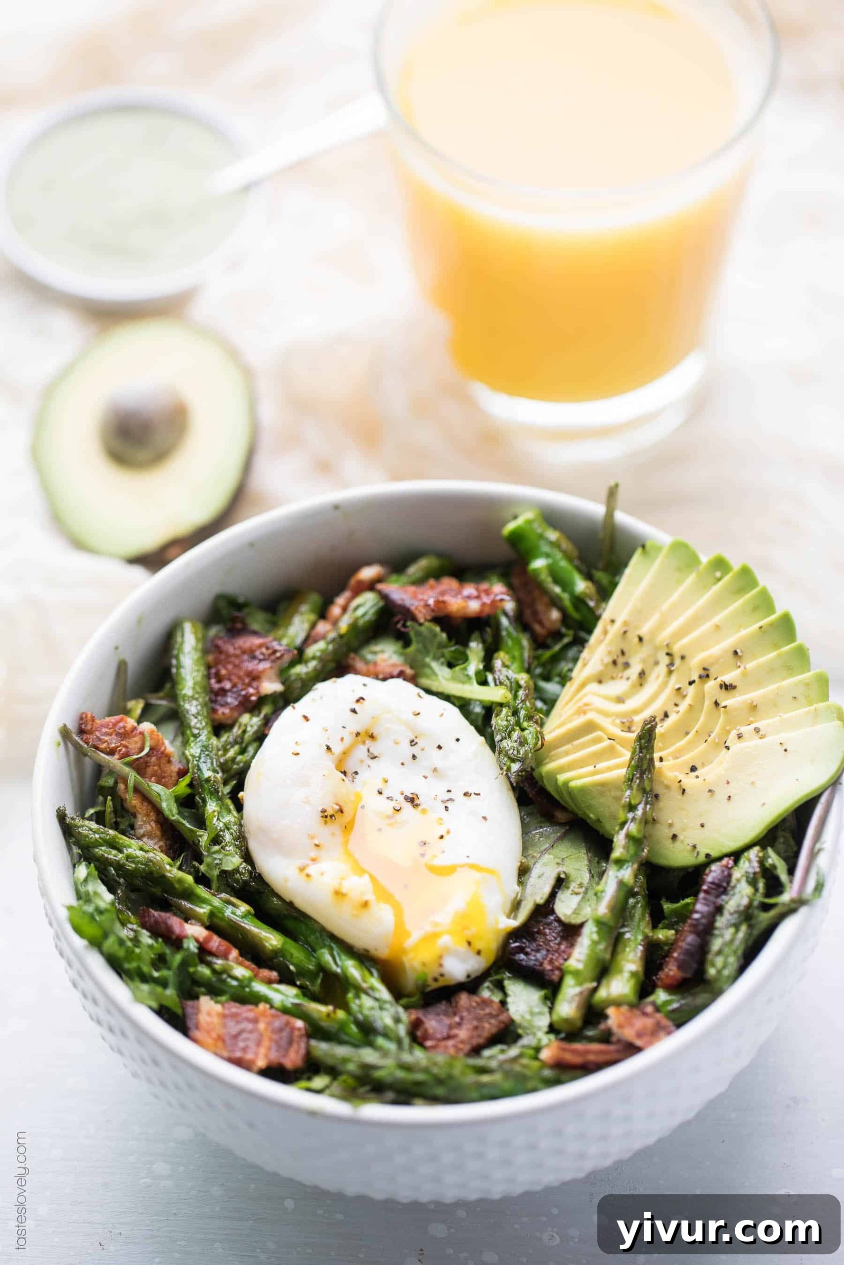 Keto + Whole30 Brunch Kale Salad - baby kale tossed in an herby green dressing topped with bacon, asparagus and a poached egg (gluten free, grain free, dairy free, sugar free, clean eating)
