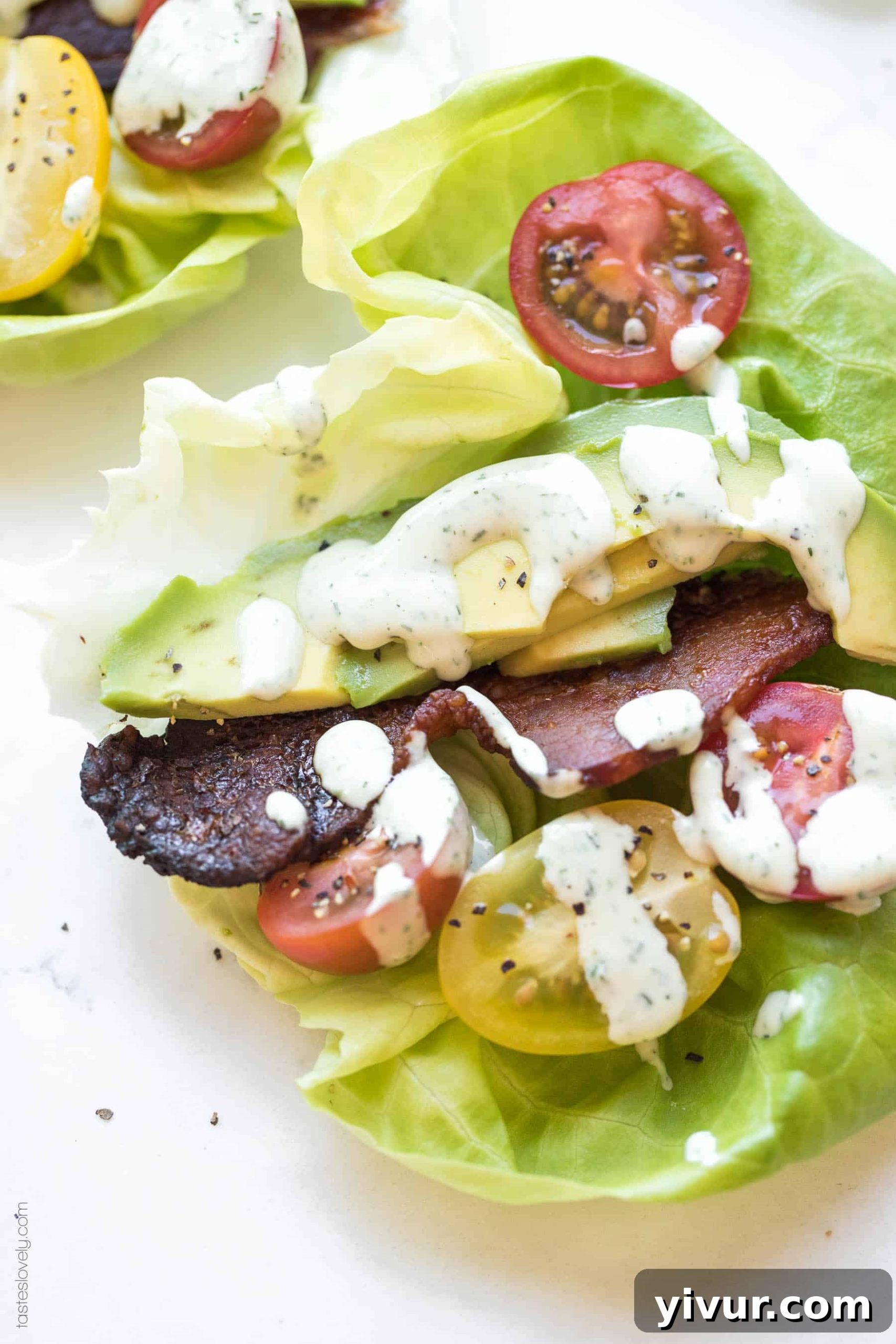 Paleo, Whole30, Keto BLT Lettuce Wraps, perfect for a healthy and satisfying meal or appetizer.