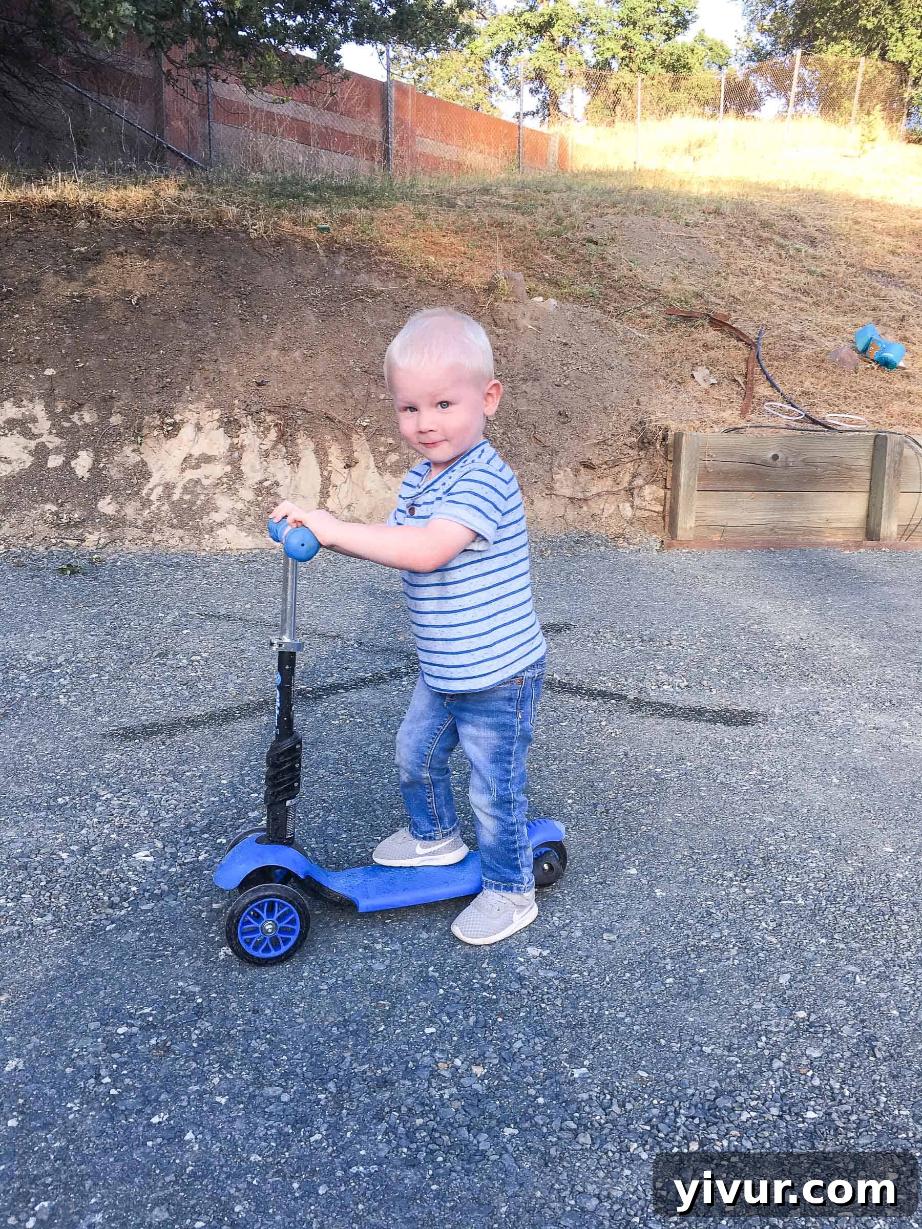 Spring 2018 A Daily Perspective 14 Husband cooking paleo meatballs in the kitchen while his pregnant wife and toddler relax on the couch.