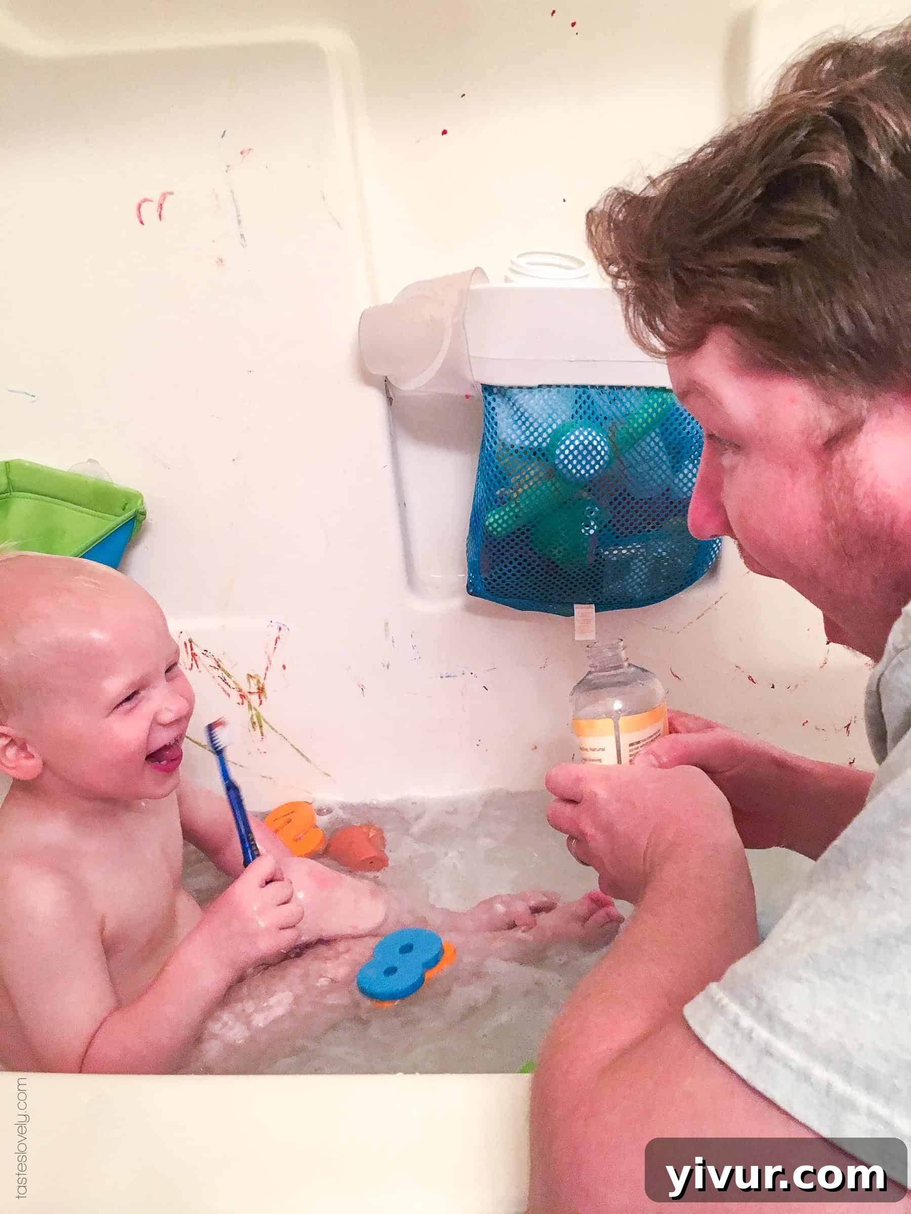 Spring 2018 A Daily Perspective 16 A toddler happily eating dinner, with a plate of meatballs and zoodles, showing a healthy and hearty meal.