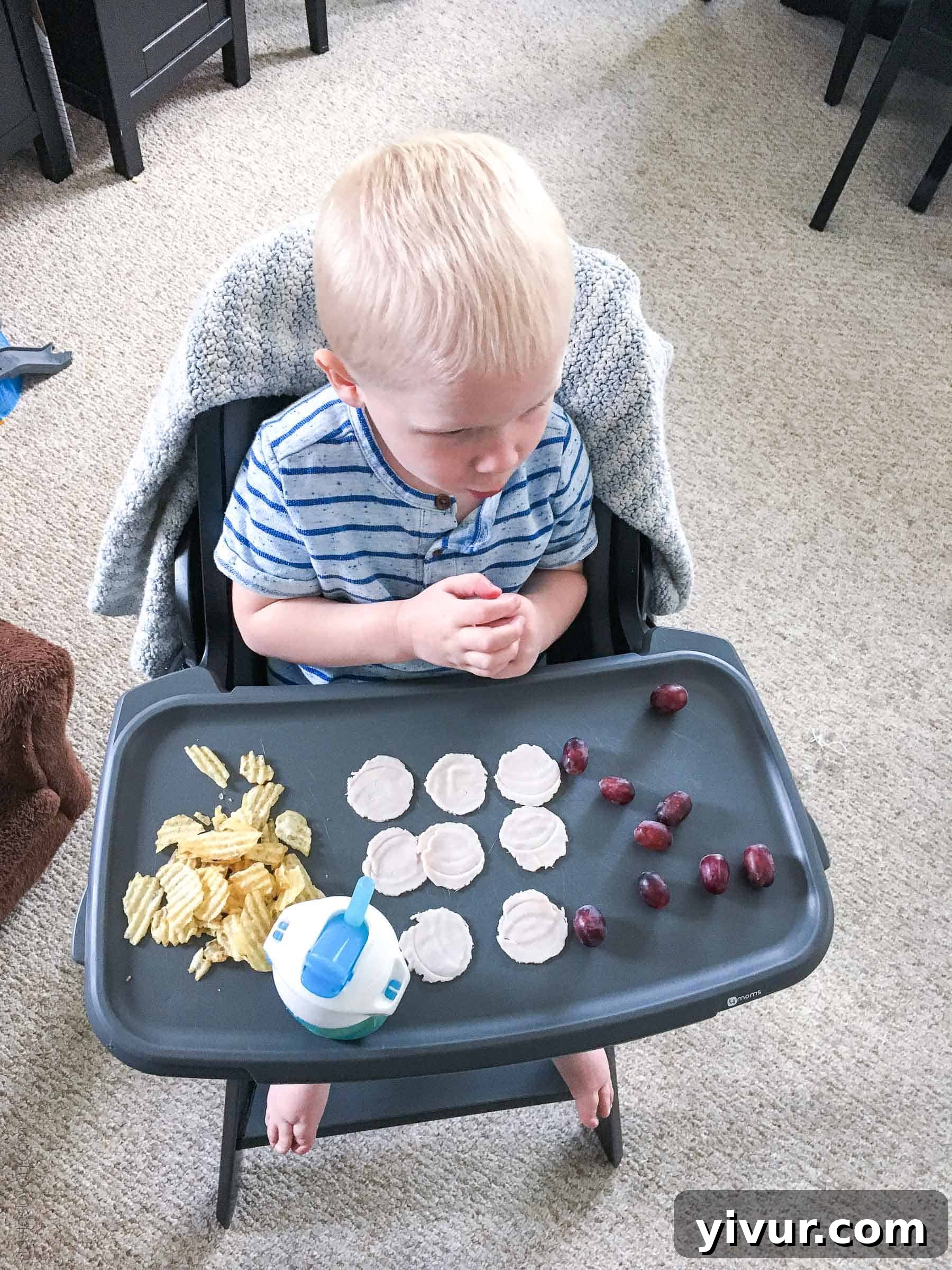 Spring 2018 A Daily Perspective 8 Family members working together on a retaining wall project outside a home, with a toddler playing nearby.