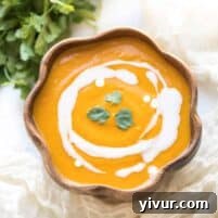 A bowl of Paleo + Whole30 Thai Curry Roasted Butternut Squash Soup