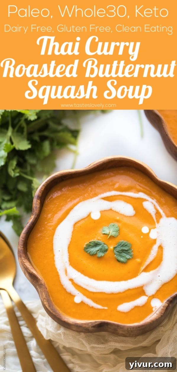 A vibrant vertical shot of a bowl of Thai Curry Roasted Butternut Squash Soup, garnished with cilantro.
