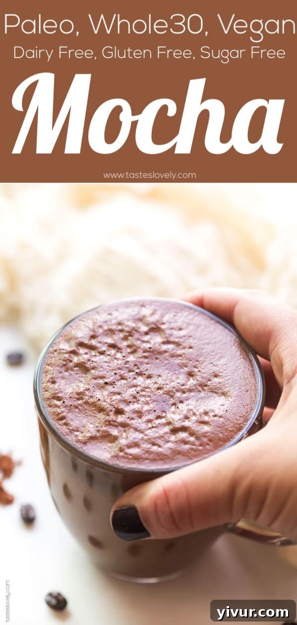 A full-length image of the Paleo + Whole30 Mocha, showcasing the drink in a clear glass on a rustic background.