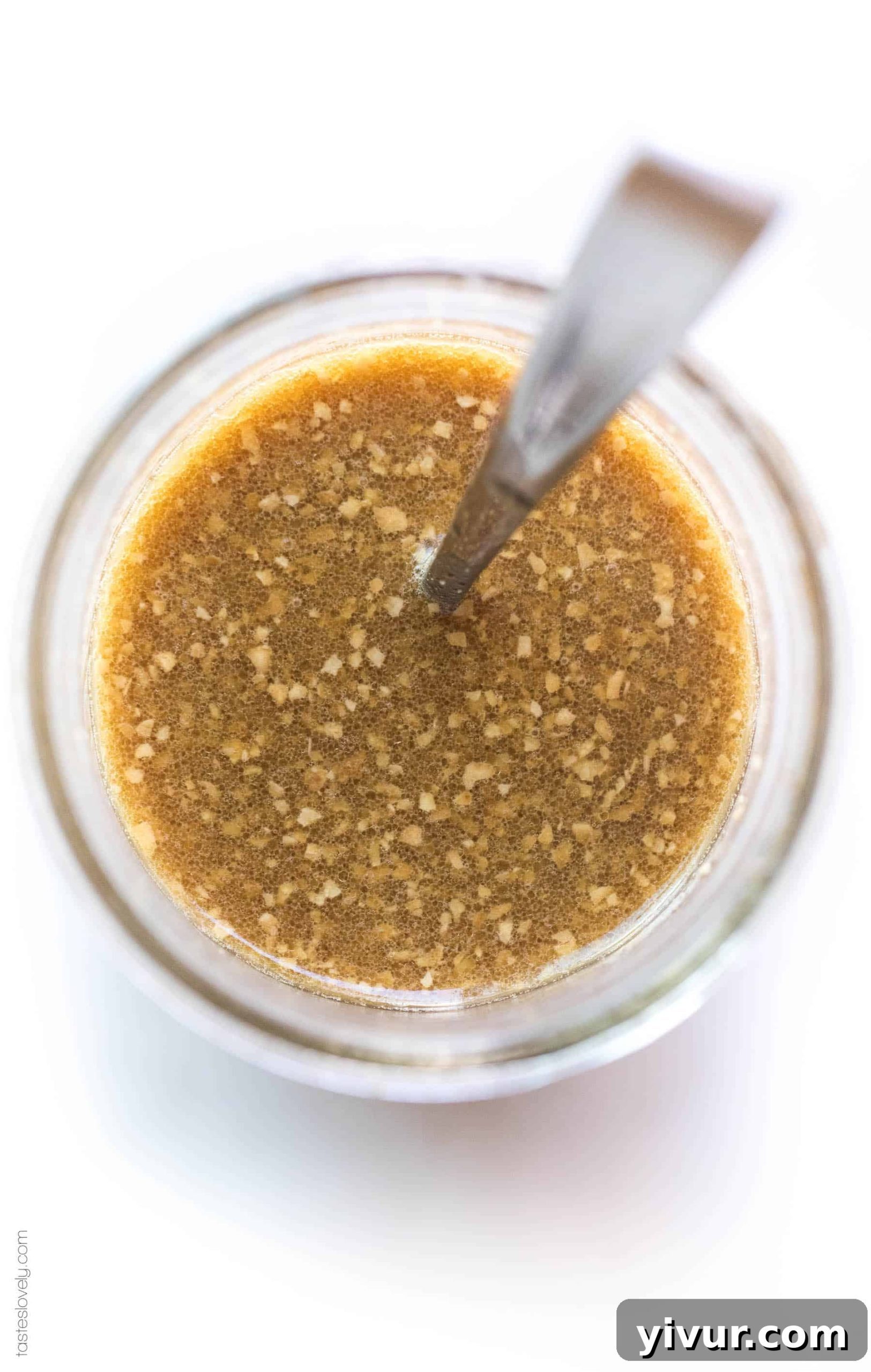Delicious 5 Minute Whole30 and Paleo Stir Fry Sauce Soy Free 4 The smooth, thick consistency of stir fry sauce visible inside a mason jar